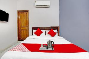 Katil atau katil-katil dalam bilik di Flagship Hotel The Royal Near Akshardham