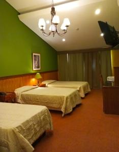 Cama ou camas em um quarto em Hotel Bristol Asuncion