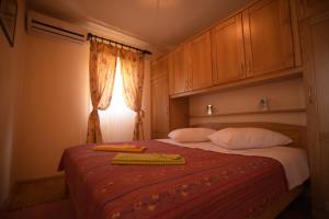 Ένα ή περισσότερα κρεβάτια σε δωμάτιο στο Apartment Ilario