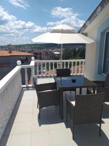 A balcony or terrace at Exotic Guest House