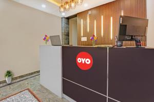 an office reception counter with aoops logo on it at Flagship Hotel Royals in Rānchī