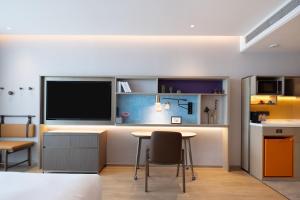 Majoituspaikan Home2 Suites by Hilton Hefei South Railway Station keittiö tai keittotila