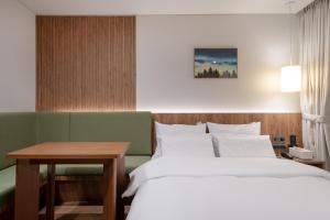 Katil atau katil-katil dalam bilik di Simjak Hotel by Aank