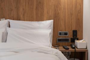 Katil atau katil-katil dalam bilik di Simjak Hotel by Aank