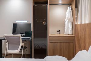 Katil atau katil-katil dalam bilik di Simjak Hotel by Aank