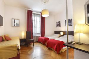 Posteľ alebo postele v izbe v ubytovaní Hotel Tor