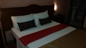 Postel nebo postele na pokoji v ubytování Hotel Chopin