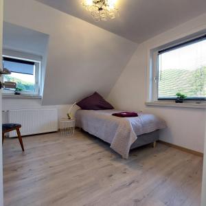 Postel nebo postele na pokoji v ubytování Hotel 24