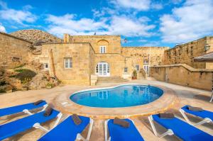 Πισίνα στο ή κοντά στο Gharilma V Holiday Home