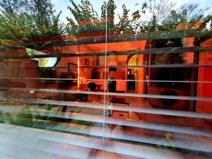 a view of a window with blinds on it at zentral club neutron-jacuzzi in Belmonte de Miranda