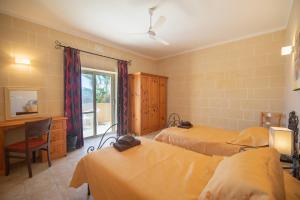 Postel nebo postele na pokoji v ubytování Rebekah Holiday Home