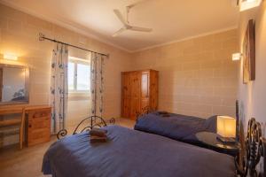 Postel nebo postele na pokoji v ubytování Rebekah Holiday Home
