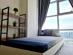 Postel nebo postele na pokoji v ubytování 4 Guest Studio Subang Jaya SS15 Courtyard First Subang LRT SS15 Subang Jaya Medical Center Subang Parade Nu Empire Subang Inti College Taylors College