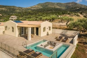 an image of a house with a swimming pool at Uberina - Olea Di Assos Villas in Asos