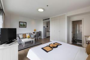 TV a/nebo společenská místnost v ubytování Kantary Bay Hotel And Serviced Apartment Rayong