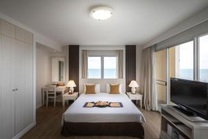 Postel nebo postele na pokoji v ubytování Kantary Bay Hotel And Serviced Apartment Rayong