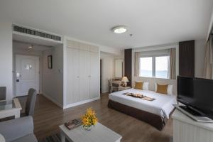 Postel nebo postele na pokoji v ubytování Kantary Bay Hotel And Serviced Apartment Rayong