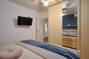 Кровать или кровати в номере Apartment San Pietro
