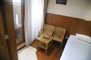 Katil atau katil-katil dalam bilik di Hotel Sidney