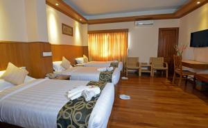 Katil atau katil-katil dalam bilik di Hotel Sidney