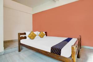 Un ou plusieurs lits dans un hébergement de l'établissement SPOT ON Aiwa Residency
