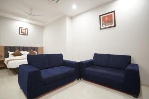 A seating area at Hotel Krishna Inn