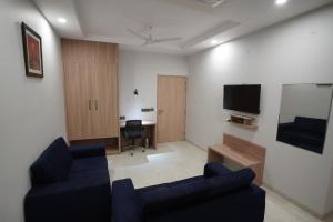 A television and/or entertainment centre at Hotel Krishna Inn