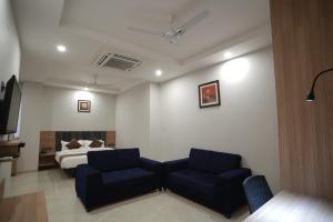 A seating area at Hotel Krishna Inn