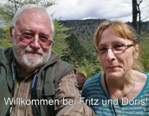 un hombre mayor y una mujer posando para una foto en C4 Albmatte-FEWO Sauna, Hallenbad Außenbecken Massagen nebenan, en Menzenschwand