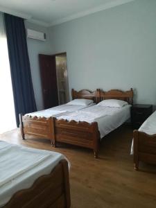 A bed or beds in a room at жули