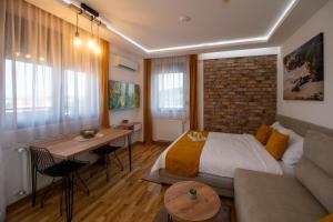 Posezení v ubytování Lux Apartman Sunce + 25 fotografií