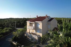 an aerial view of a house with a river at Villa B&M in Petrcane