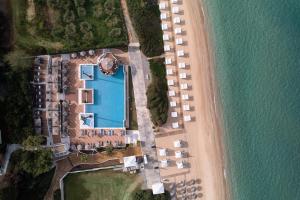 an aerial view of a resort next to a beach at Pomegranate Wellness Spa Hotel in Nea Potidaea