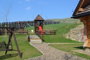 a park with a playground with a gazebo at Sokolisko - pensjonat agroturystyczny in Wysoczany