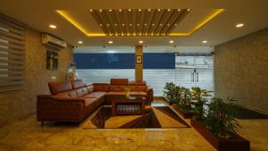 Oryx Home The Business Class Hotel的休息区