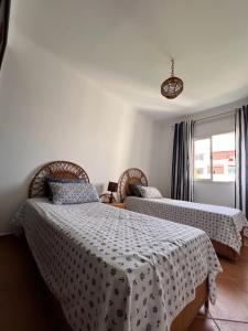 Postel nebo postele na pokoji v ubytování Appartement Haut Standing Les Dunes De Martil