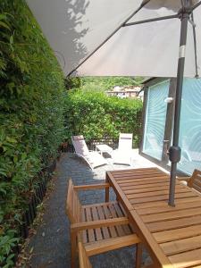 Imagen de la galería de Appartamento IL GELSOMINO con giardino e piscina, en Porlezza 18 fotos más