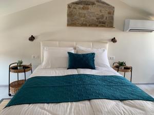 Ένα ή περισσότερα κρεβάτια σε δωμάτιο στο Casa Pozzetto