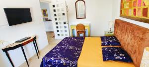 Krevet ili kreveti u jedinici u objektu Appartement richement meublé a Sidi Bou Said