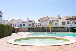 Bazén v ubytovaní Casa en la playa con piscinas A alebo v jeho blízkosti