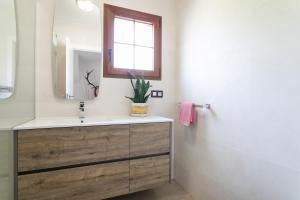 Kúpeľňa v ubytovaní Casa en la playa con piscinas A