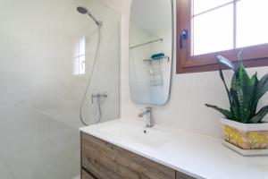 Kúpeľňa v ubytovaní Casa en la playa con piscinas A