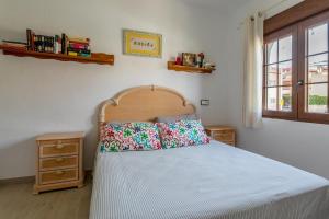 Posteľ alebo postele v izbe v ubytovaní Casa en la playa con piscinas A