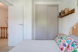 Posteľ alebo postele v izbe v ubytovaní Casa en la playa con piscinas A