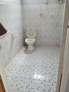 a bathroom with a toilet and a shower at Maleeya garden guest house in Ko Chang