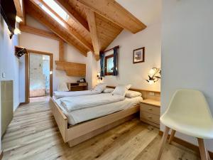 Voodi või voodid majutusasutuse B&B Cèsa Planber Mountain View BIKE FRIENDLY toas