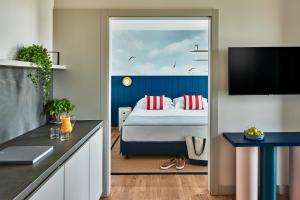 TV a/nebo společenská místnost v ubytování Falkensteiner Family Hotel Diadora