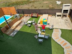 an overhead view of a backyard with a swimming pool at Casa Blanco Conde Pensión in Laza