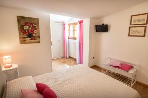 Postel nebo postele na pokoji v ubytování B&B Il Chiostro Assisi