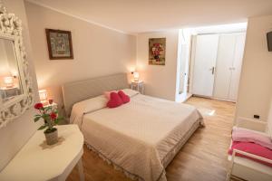 Postel nebo postele na pokoji v ubytování B&B Il Chiostro Assisi